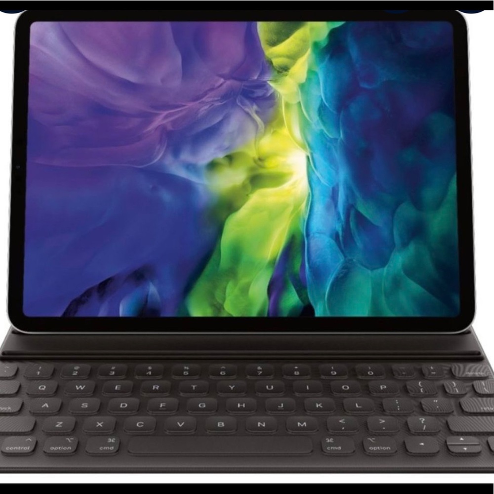 IPAD PRO 11 Inch. Brand new used twice. Comes with keyboard magnetic pen charger